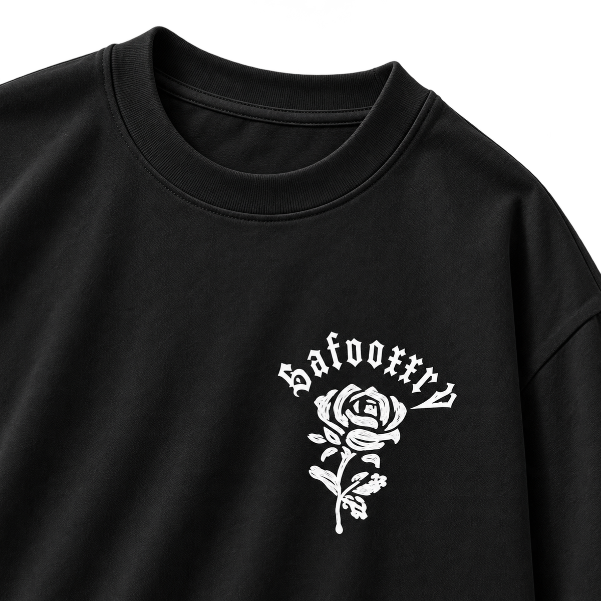 Gothic Rose Oversized Graphic Tee Black colorway, close-up of collar and white rose chest graphic